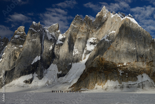 An Australian expedition led by porters is moving towards snowlake while crossing Mount Sosbun Brakk (6413m) in Karakoram range of Gilgit Baltistan region in Pakistan. photo