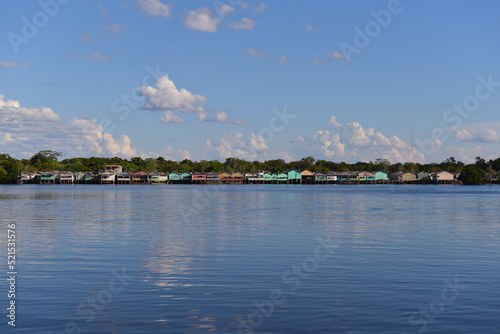 The colorful stilt village of Buena Vista, Beni Department, Bolivia, seen from the town of Costa Marques, Rondonia state, Brazil, just across the Guaporé - Itenez river