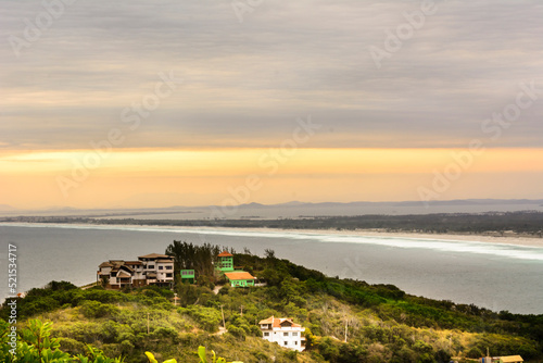 Sunset over the sea and beach at Arraial do Cabo town, State of Rio de Janeiro, Brazil. Taken with Nikon D7100 18-200 lens, at 56mm, 1/100 f 14 ISO 100.