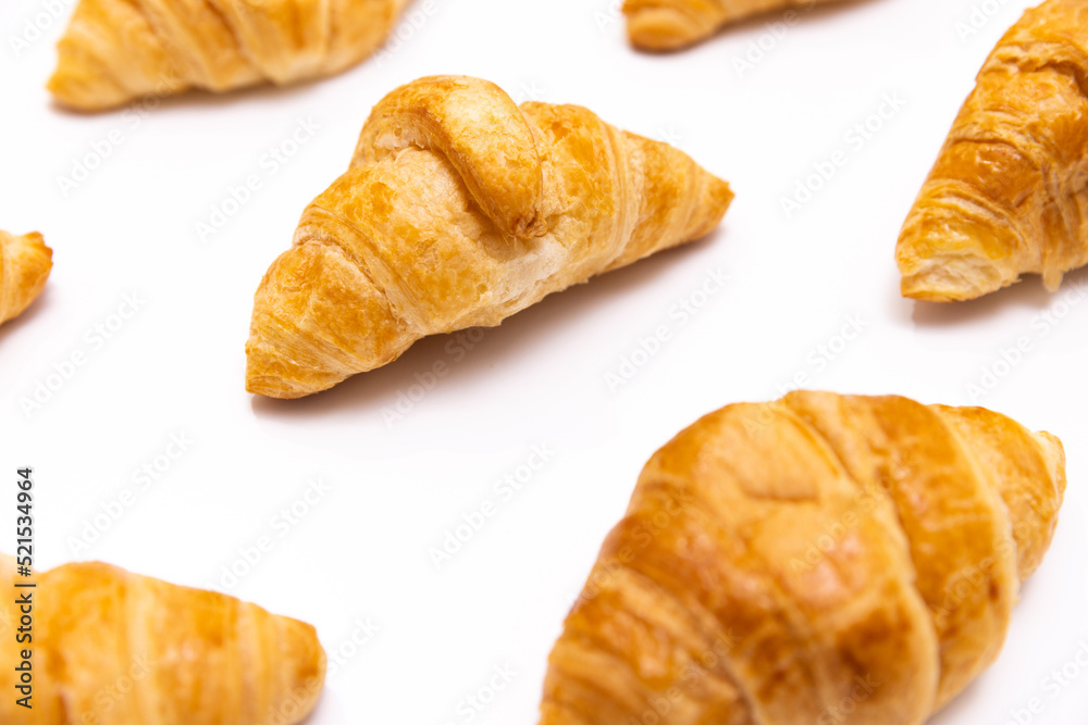 Croissants Patterned On White Surface