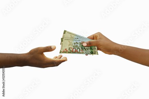 Hand giving 3D rendered 500 Azerbaijani manat notes to another hand. Hand receiving money