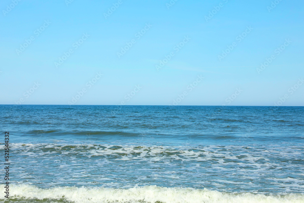 Picturesque view of beautiful sea and blue sky on sunny day