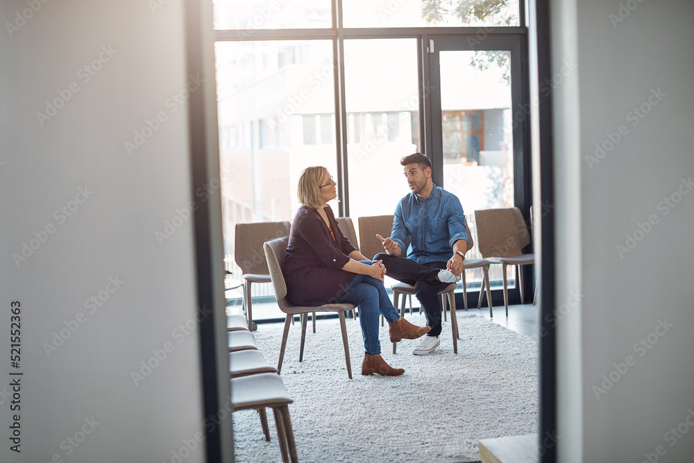 © Daniel Laflor/peopleimages.com - Business man in a job interview with a businesswoman talking about hiring and recruitment. An HR manager and employee sitting and having a discussion or meeting in a modern office or workplace © Daniel Laflor/peopleimages.com - Business man in a job interview with a businesswoman talking about hiring and recruitment. An HR manager and employee sitting and having a discussion or meeting in a modern office or workplace