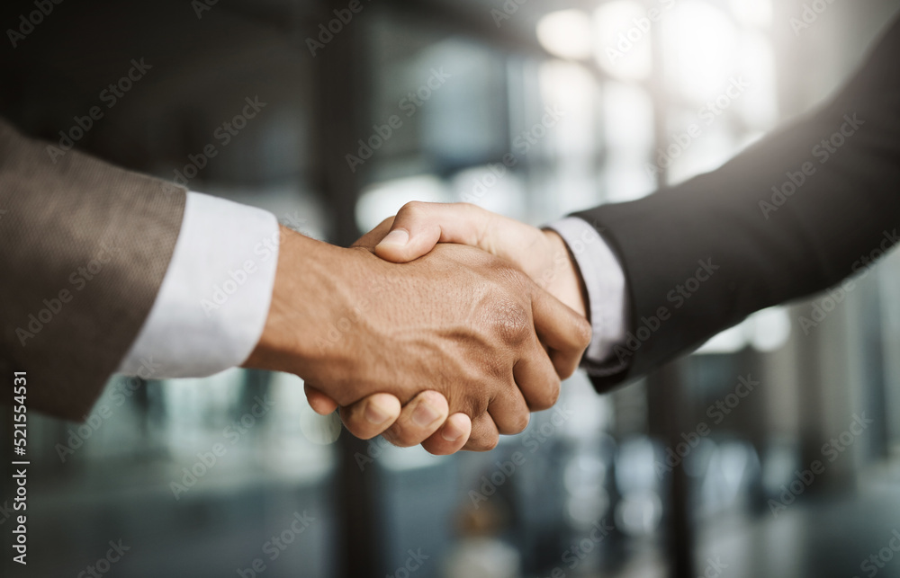 Business men in handshake hand showing success, support and trust through sign and symbol. Closeup fingers of office executives making deal and approving or welcoming, greeting and promoting Business men in handshake hand showing success, support and trust through sign and symbol. Closeup fingers of office executives making deal and approving or welcoming, greeting and promoting