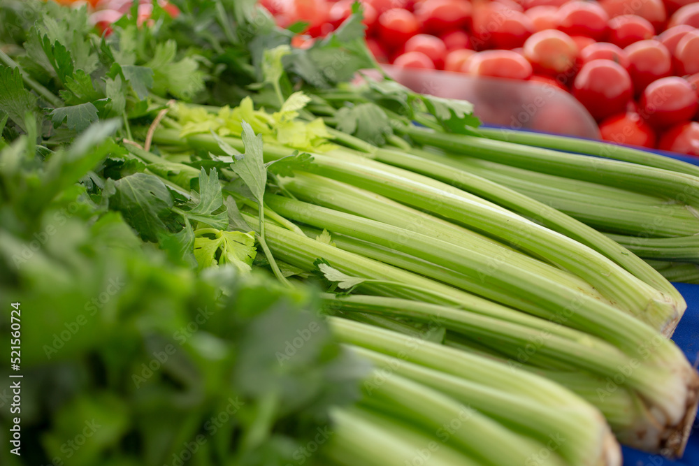 A view of a table full of celery, on display at a local farmers market. A view of a table full of celery, on display at a local farmers market.