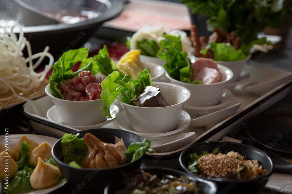 A view of all the elements of a hot pot meal. A view of all the elements of a hot pot meal.