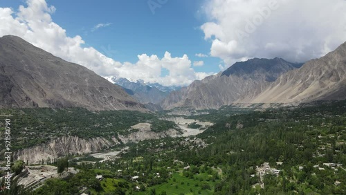 Aerial footage of the mountains of Hunza valley, Gilgit Baltistan Pakistan, drone flying towards Rakaposhi and Hunza Valley.  RAW and Smooth Footage.
