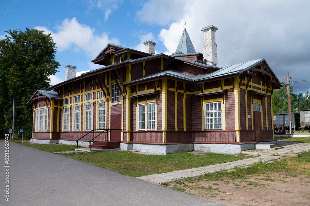 Old wooden building of the railway station on Kuzhenkino station on July afternoon