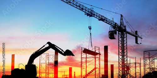 construction work on high ground heavy industry and safety concept over blurred natural background sunset pastel