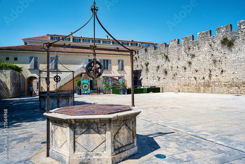 Renaissance Square of five wells in Zadar surrounded by the western medieval wall and the Captain's tower on 22 May 2022, in Zadar, Croatia.