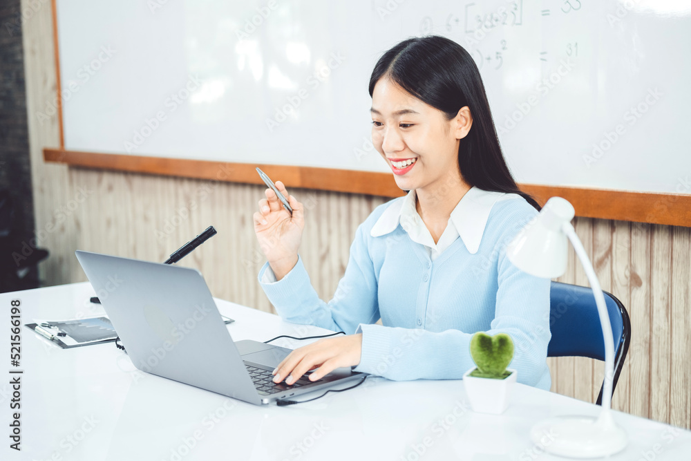 Teacher remotely using camera to stream lesson working call video conference teaching online in blackboard to student Teacher remotely using camera to stream lesson working call video conference teaching online in blackboard to student