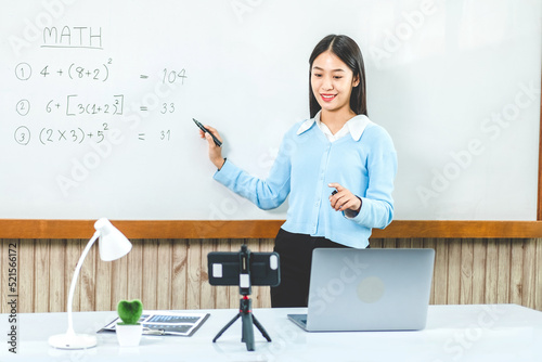 Teacher remotely using camera to stream lesson working call video conference teaching online in blackboard to student