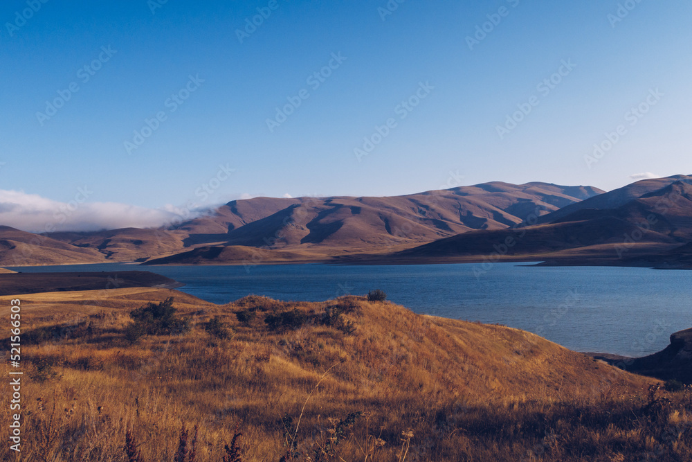 Fototapeta premium Beautiful autumn sunset view of Sevan lake, Sevan, Armenia