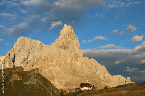 Panoramic view with orange colors in Rolle Pass in Italy photo