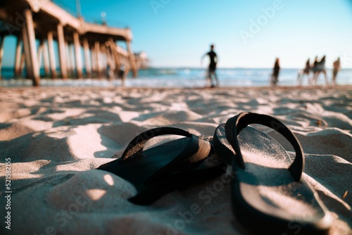 Closeup shot of beach sneakers. Huntington Beach, CA photo