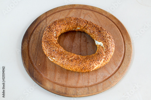 Turkish pastry product , tasty pogaca. Simit, gevrek. Turkish Pastries; peynirli, patatesli, kasarli pogaca, borek, acma, ay coregi at patisserie showcase. photo