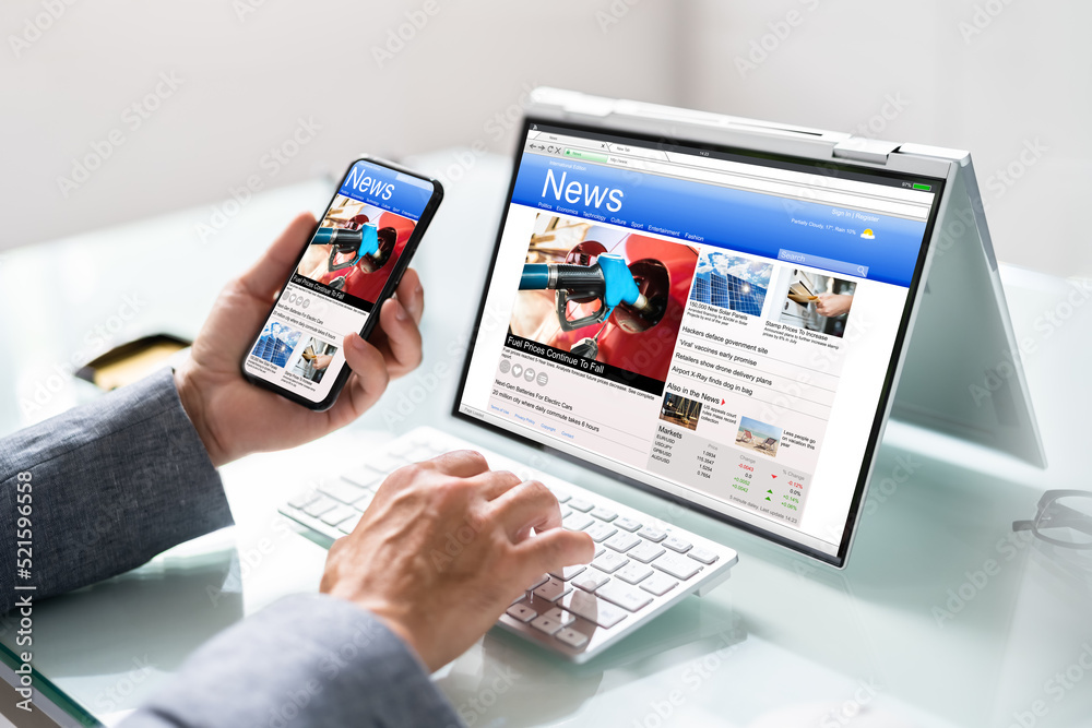 Watching News On Screen. Reading Newspaper Website Watching News On Screen. Reading Newspaper Website