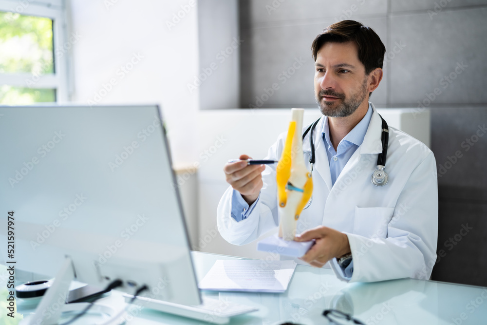 Orthopedist Physician Doctor Showing Skeletal Joint Orthopedist Physician Doctor Showing Skeletal Joint