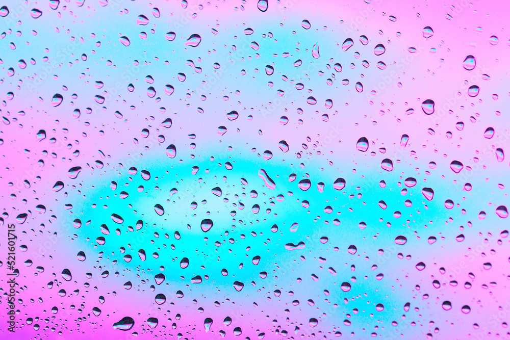 Drops at vibrant background . Droplets at transparent surface