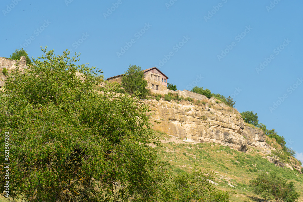 Ancient chufut road cave bakhchisaray city crimea medieval fortress monument, for history blue from tourism from rock kale, limestone bakhchisarai. View outdoors stony,