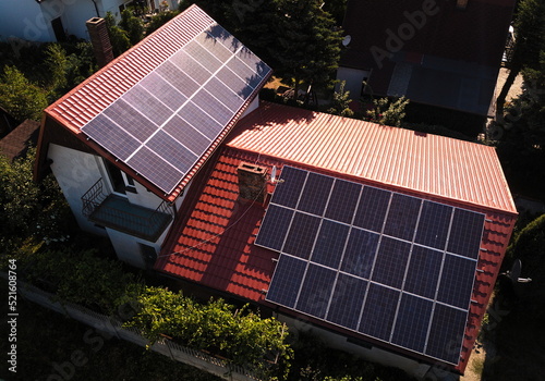 View from the drone to photovoltaic panels on the roof