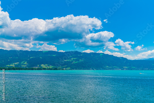 Germany, Beautiful panorama view above lakeside of turquoise bodensee lake water at austrian coast at bregenz pfaender mountain