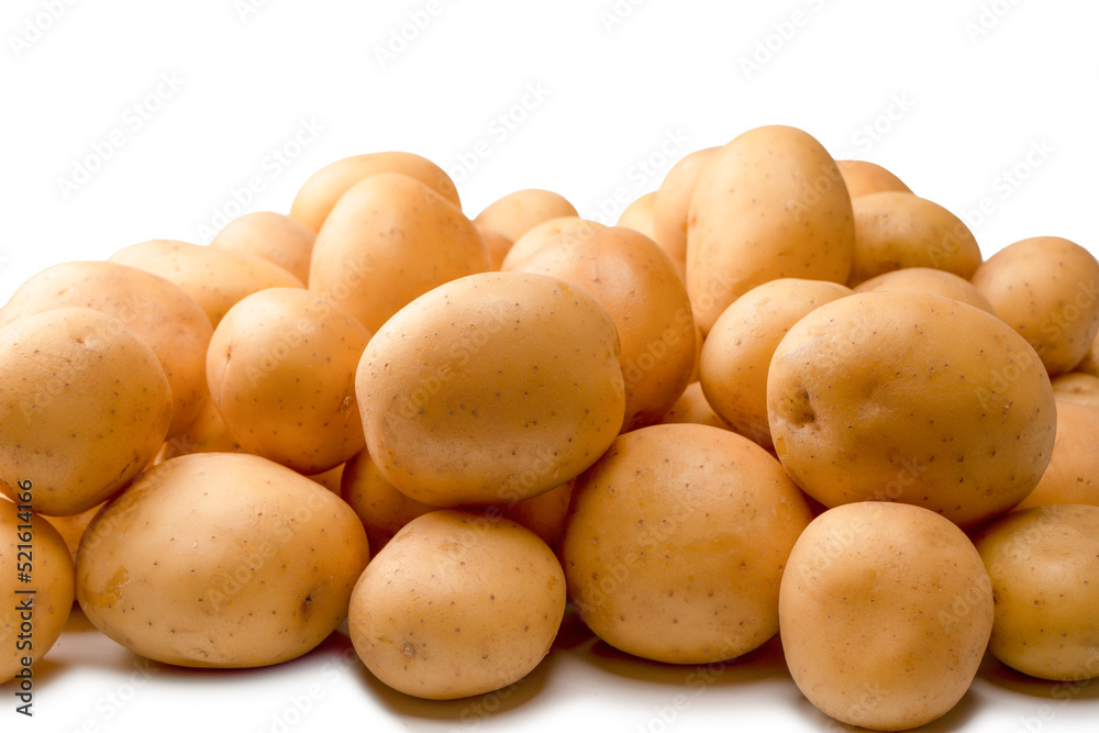 A group of fresh tasty potato isolated on white background. A group of fresh tasty potato isolated on white background.