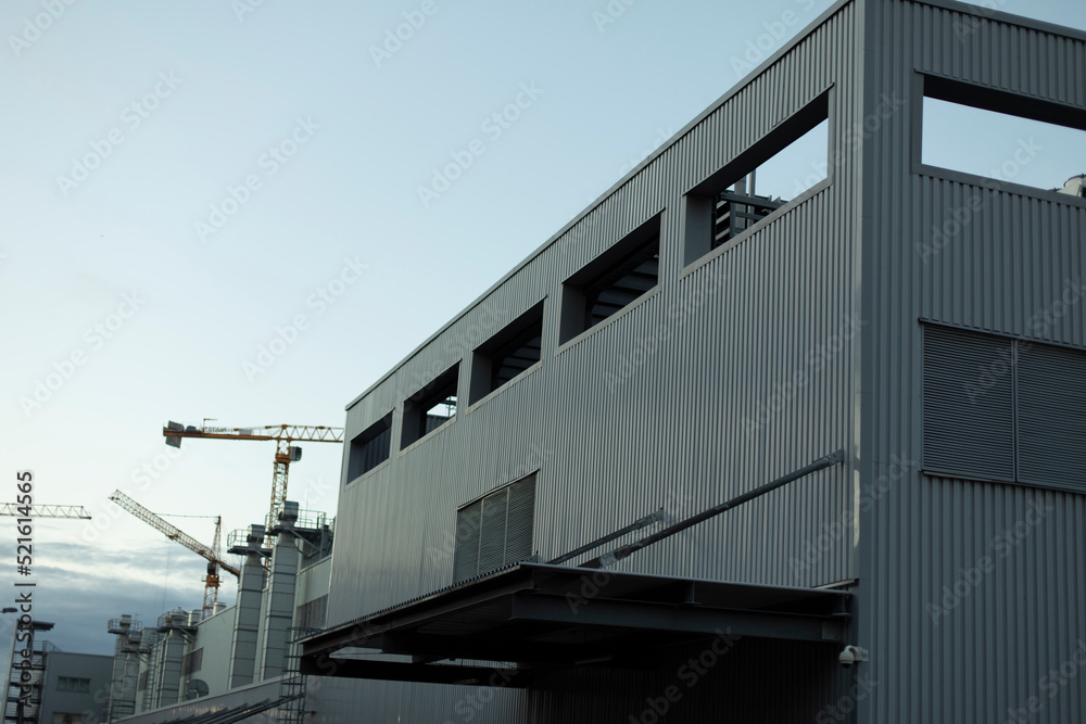 Factory building. Industrial structure. Technical building in city.