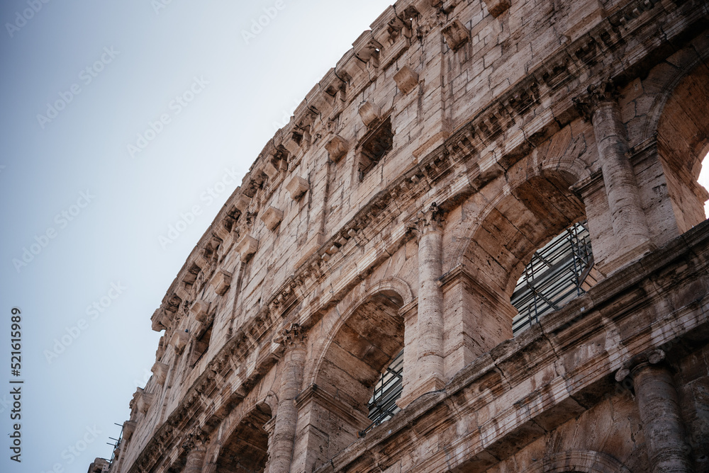 Exterior view of facade of Colosseum of Rome, Italy, UNESCO World Heritage Site. Coloseo, Flavian Amphitheater the symbol of ancient Roman Empire