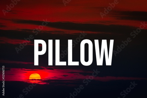 PILLOW - word on the background of the sky with clouds. © Ilya