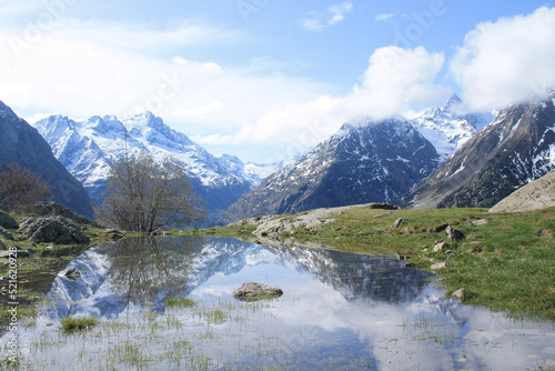 Fetoules mirror, a beautiful lake in Ecrins national park in the french alps, Oisans region