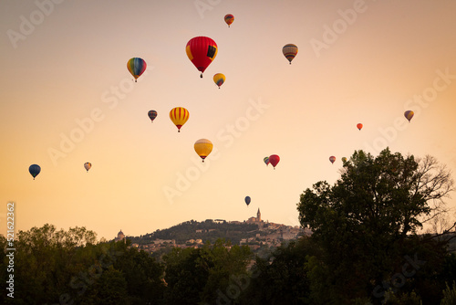 hot air balloons in the Umbrian skies