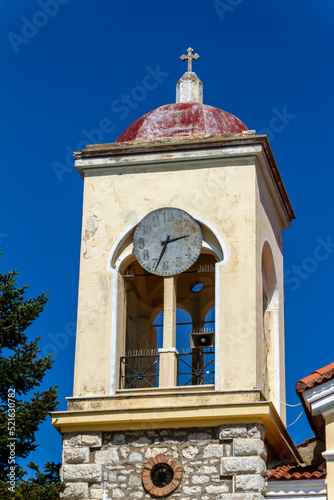 Kalavrita, Greece, July 18, 2022. Church in the village of Kalavrita with the clock stopped as the Germans executed the village men. photo
