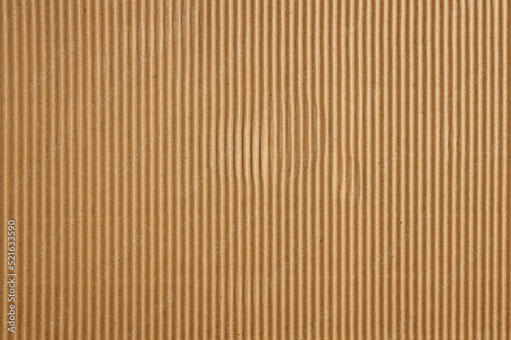 Craft Striped Corrugated Paper Texture Background. Recycling Material. Closeup shot Craft Striped Corrugated Paper Texture Background. Recycling Material. Closeup shot