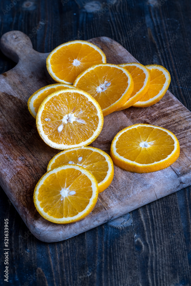 ripe orange cut into slices during cooking ripe orange cut into slices during cooking