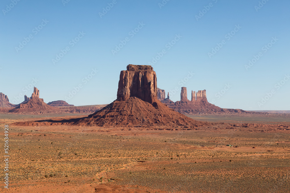 Desert Rocky Mountain American Landscape. Sunny Blue Sky Day. Oljato-Monument Valley, Utah, United States. Nature Background