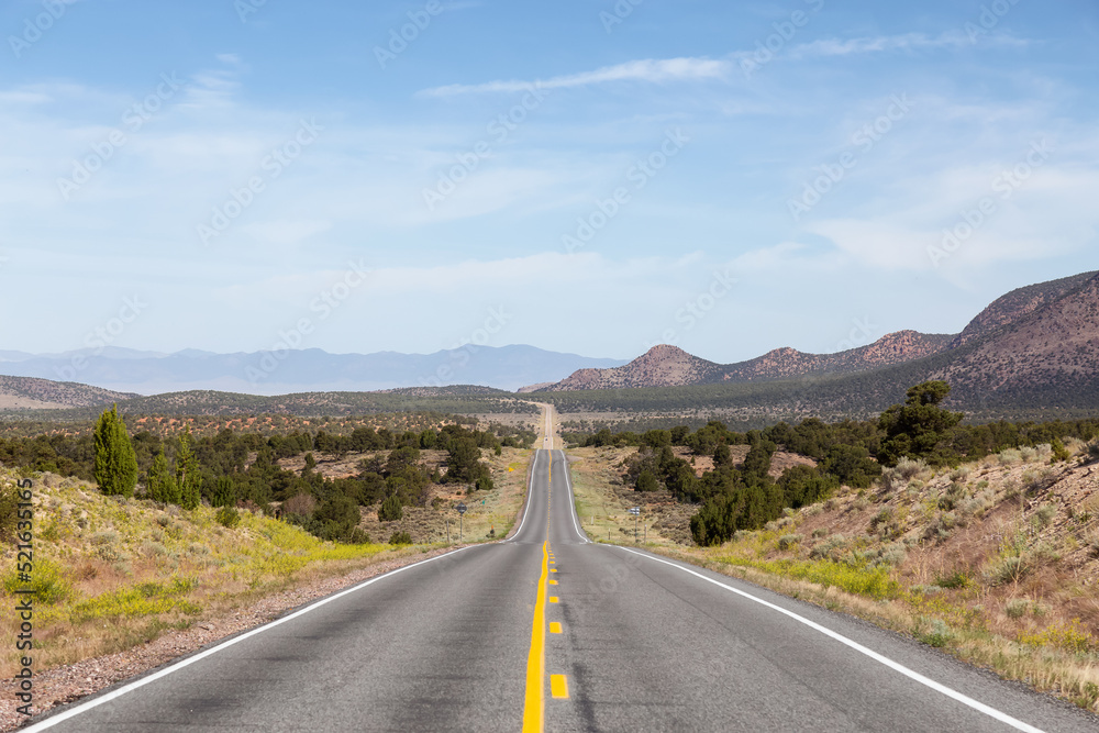 Scenic Highway Route in the Desert with American Mountain Landscape. Sunny Morning. Utah, United States of America. Scenic Highway Route in the Desert with American Mountain Landscape. Sunny Morning. Utah, United States of America.