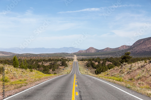 Scenic Highway Route in the Desert with American Mountain Landscape. Sunny Morning. Utah, United States of America.
