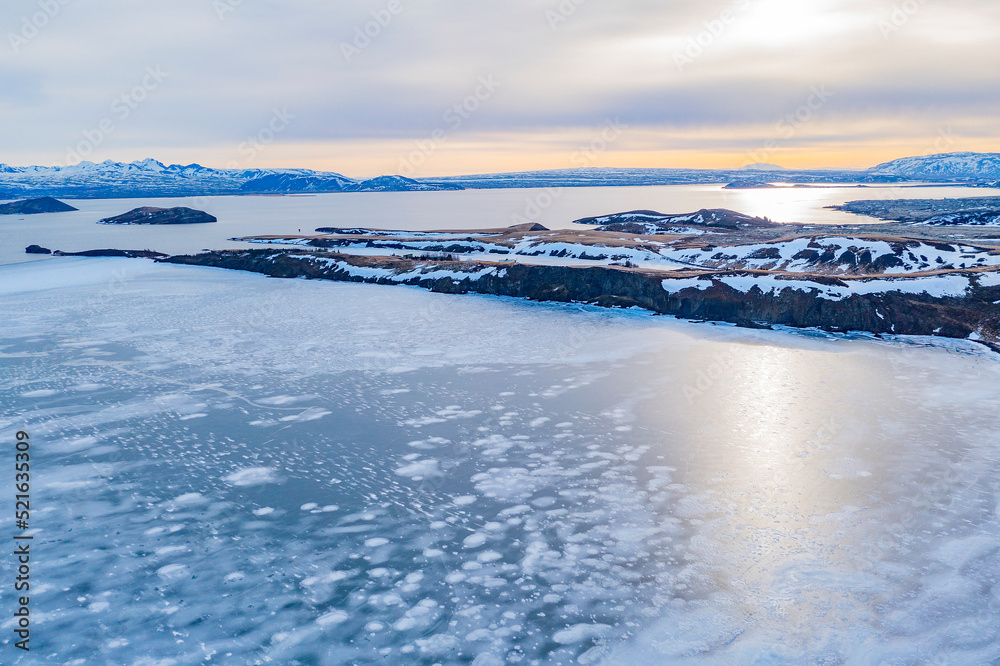 Aerial view of a frozen lake in winter, Southern Peninsula, Iceland. Aerial view of a frozen lake in winter, Southern Peninsula, Iceland.