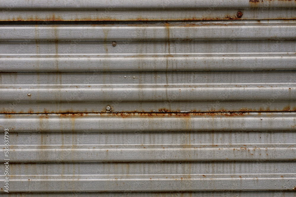 metal texture of an old gray striped iron wall in brown rust metal texture of an old gray striped iron wall in brown rust