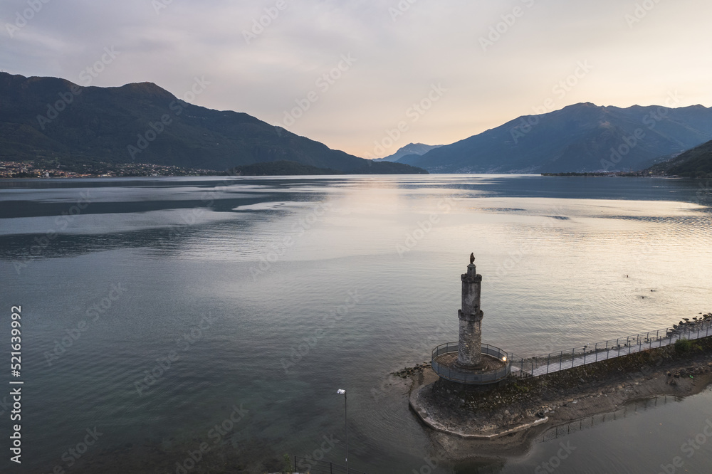 Aerial view of Lake of Como in Port of Gera Lario. Harbor entrance with Madonna on top of the tower. Italy