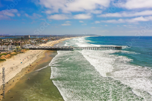 Aerial view of Crystal Pier facing the Pacific Ocean Beach in San Diego, California, United States.