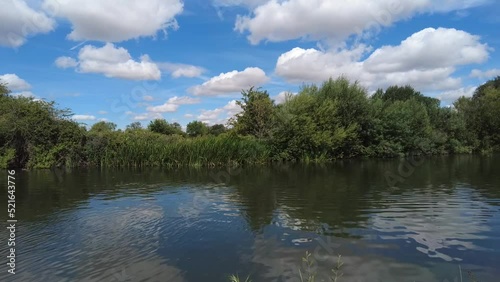 Timelapse shot of the flowing River Thames near Lechlade photo