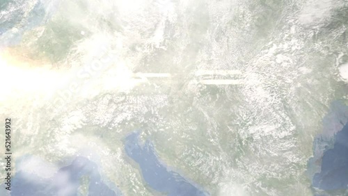 Earth zoom in from outer space to city. Zooming on Sopron, Hungary. The animation continues by zoom out through clouds and atmosphere into space. Images from NASA photo