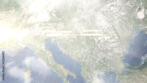 Earth zoom in from outer space to city. Zooming on Slavonski Brod, Croatia. The animation continues by zoom out through clouds and atmosphere into space. Images from NASA photo