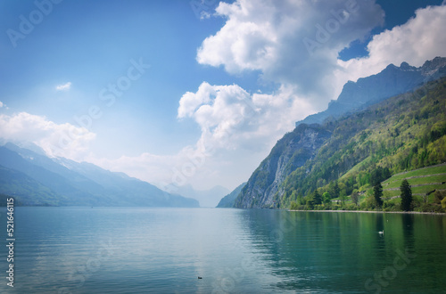 View of Lake Walen and mountains from Walenstadt, St Gallen, Switzerland photo