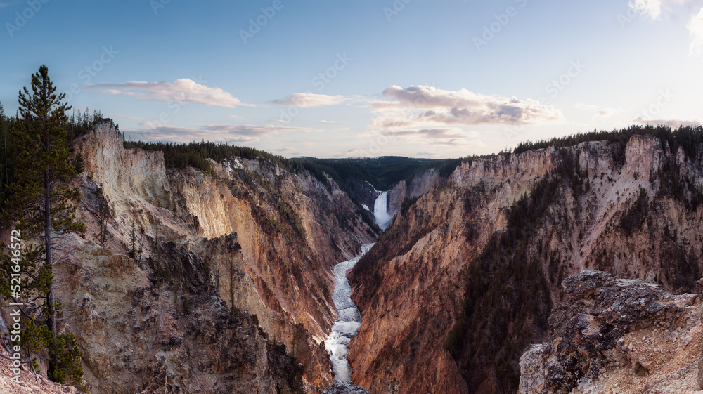 Rocky Canyon, River and Waterfall in American Landscape. Grand Canyon of The Yellowstone. Cloudy Sky Art Render. Yellowstone National Park. United States. Nature Background.