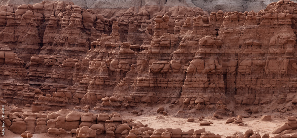 Red Rock Formations and Hoodoos in the Desert at Sunrise. Spring Season. Goblin Valley State Park. Utah, United States. Nature Background. Red Rock Formations and Hoodoos in the Desert at Sunrise. Spring Season. Goblin Valley State Park. Utah, United States. Nature Background.