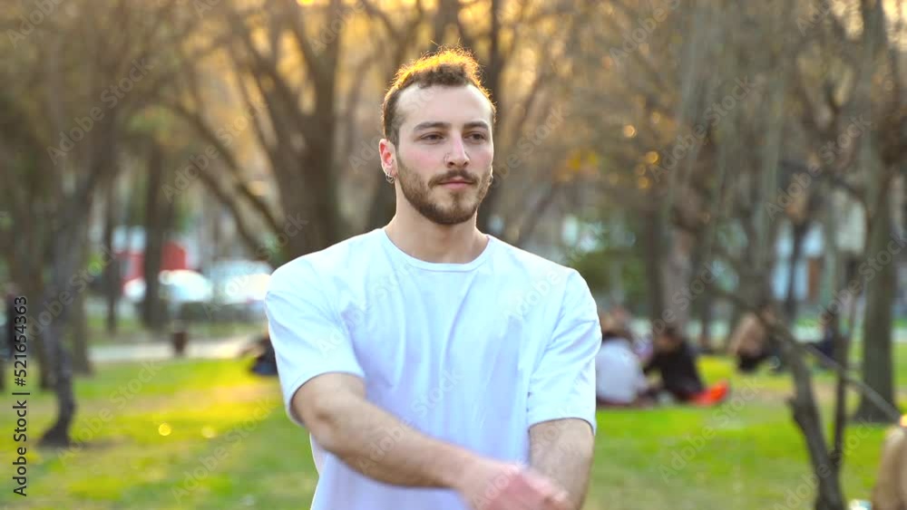 Man exercising in the park at sunset.
Man doing stretching exercises in the park at sunset. Sport and activity.
Man exercising in the park at sunset.
Man doing stretching exercises in the park at sunset. Sport and activity.