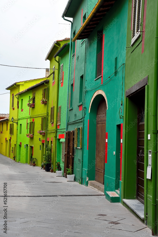 Fototapeta premium the village with the colorful houses Ghizzano tuscany Italy